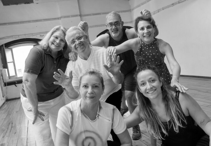 Frequency faculty and assistants posing together in a dance studio