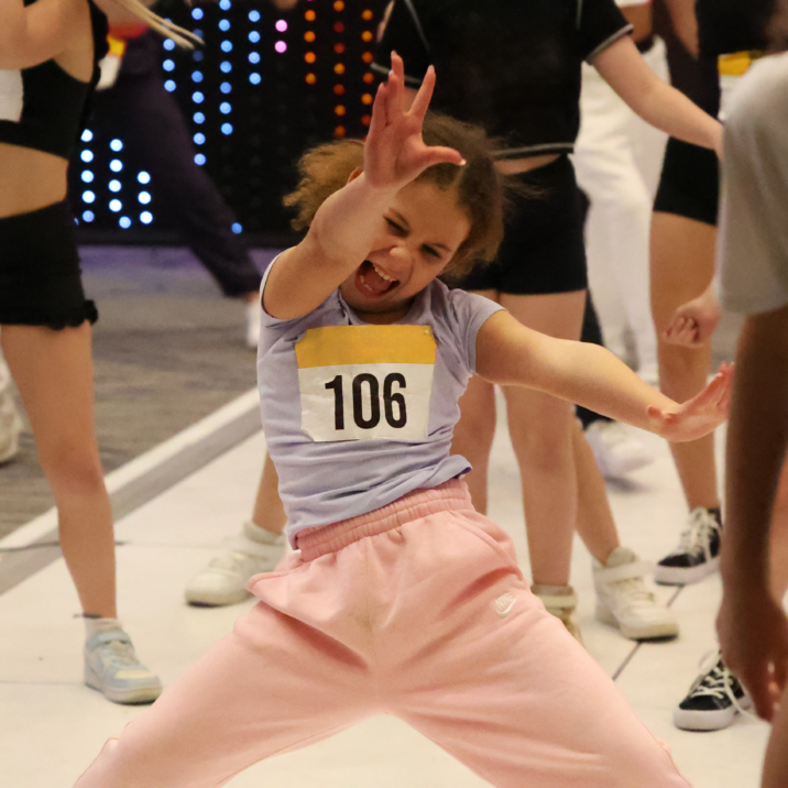 little girl rocking out dancing