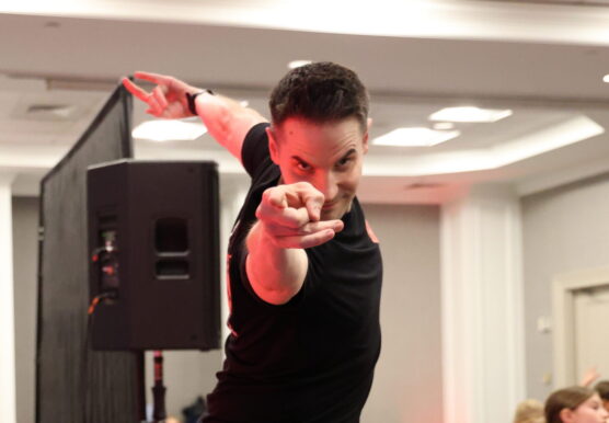 dance teacher pointing